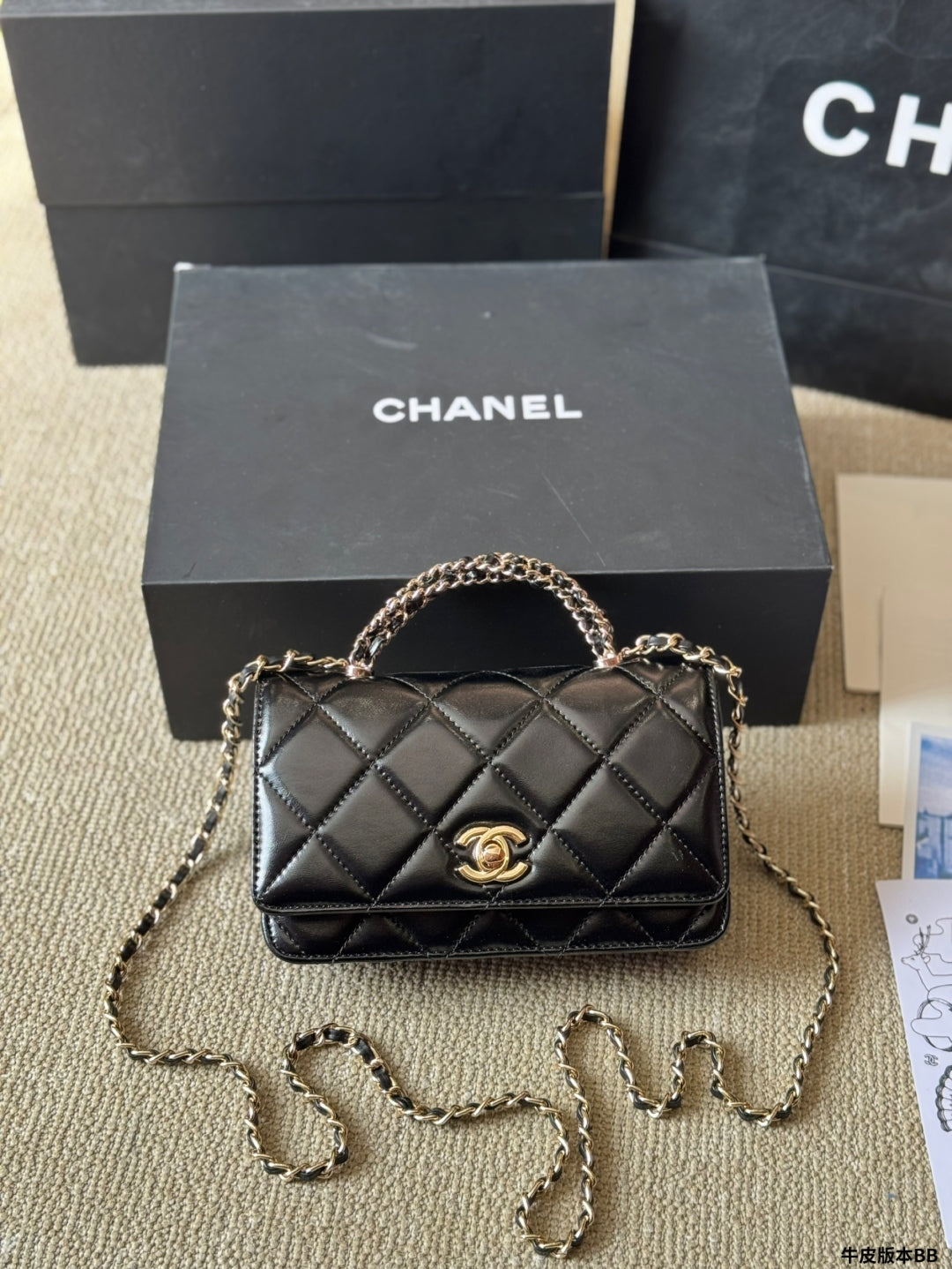 luxury 24B WOC Top Handle in Black Shiny Lambskin GHW