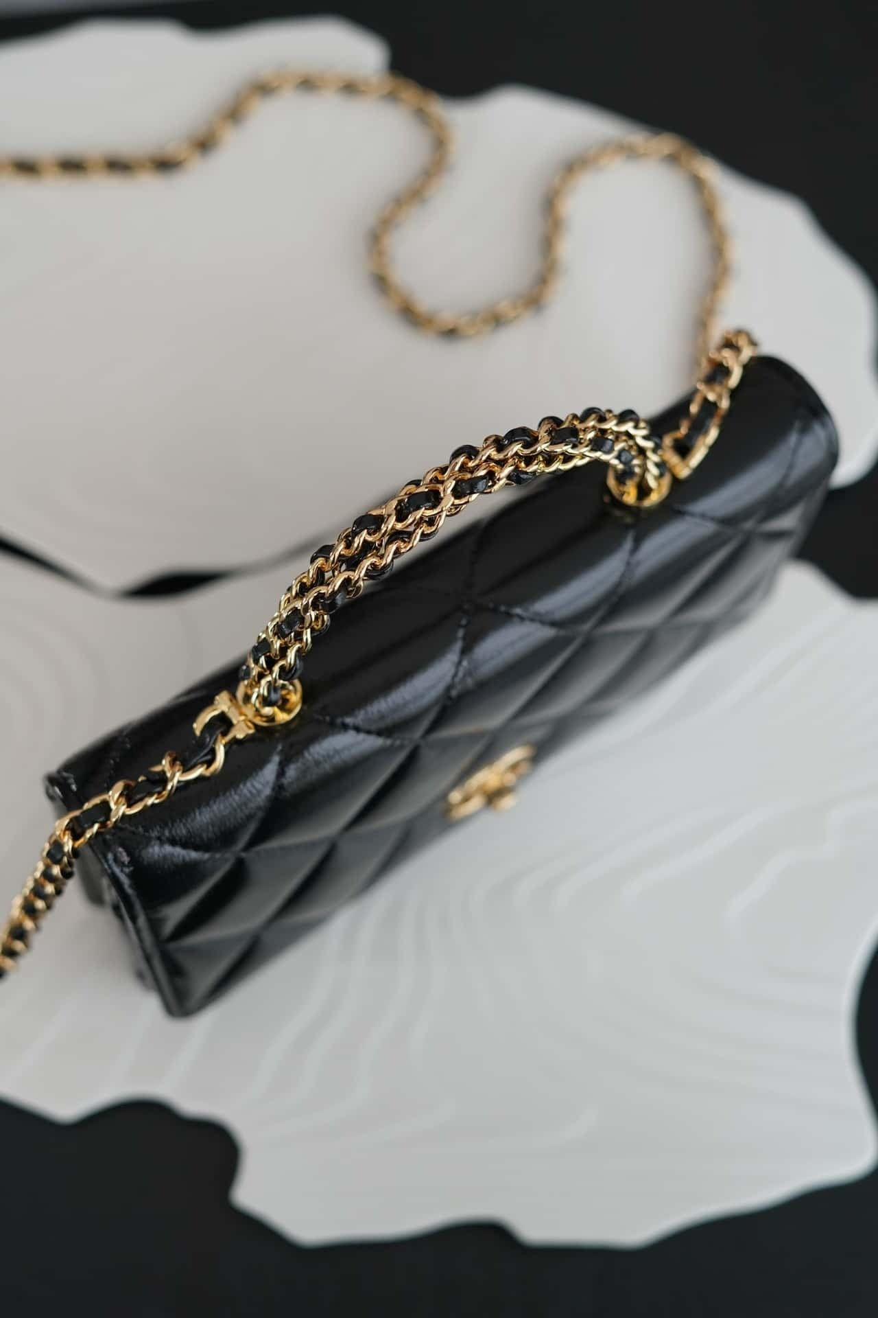 luxury 24B WOC Top Handle in Black Shiny Lambskin GHW