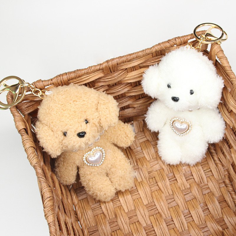 Adorable encanto de bolsas de peluche de caniche