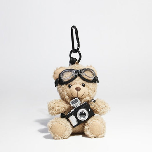 Kamera-holdende aviator bamse pose charme